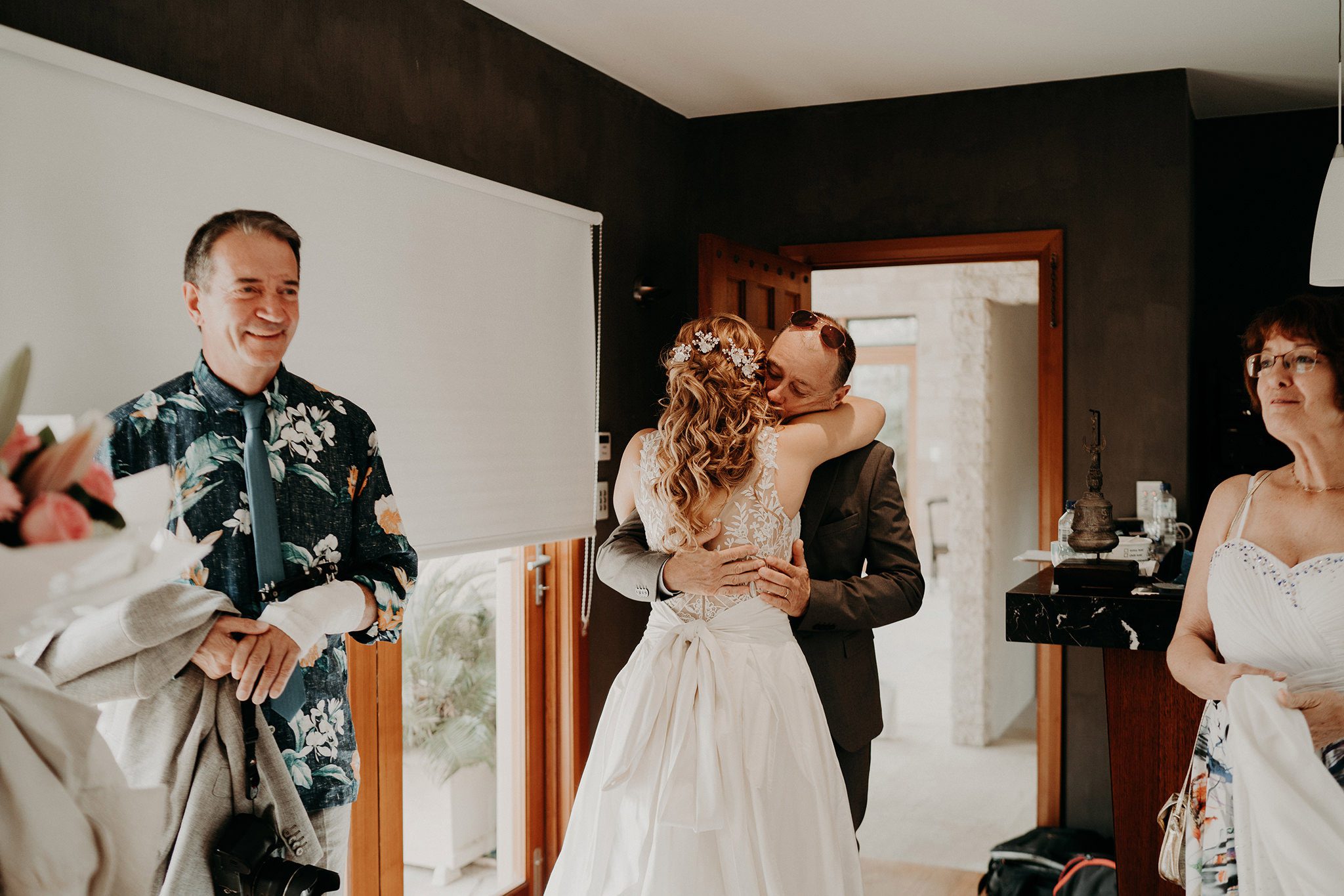 sydney boho elegant wedding. bride hugging her father