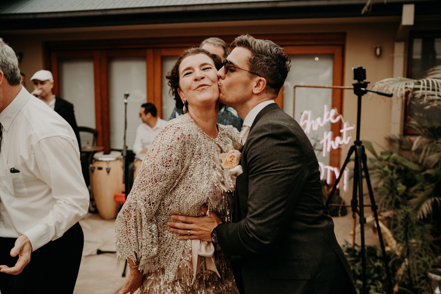 sydney boho elegant wedding. groom dancing with his mother